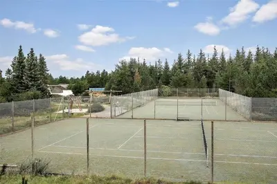 a tennis court with two tennis courts at JB628-Fjerritslev-Lynghojsletten-49 in Fjerritslev