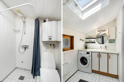 a bathroom with a toilet and a sink and a washing machine at JB272-Fjerritslev-Ronnevej-14 in Fjerritslev
