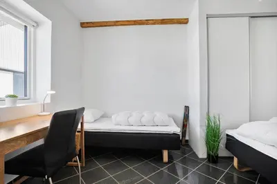 a bedroom with a desk and a bed and a chair at JB200-Fjerritslev-Udklitvej-168 in Fjerritslev