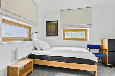 a bedroom with a bed and a window at JB227-Frostrup-Andreas-Lassens-Vej-16 in Frøstrup