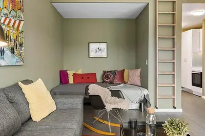 a living room with a couch and a table at JB308-Fjerritslev-Slettestrandvej-134-lejl-3 in Fjerritslev