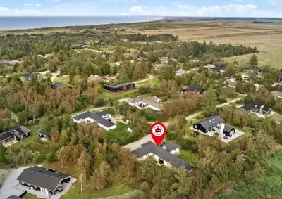 a red stop sign in front of a house at JB149-Fjerritslev-Tulipanvej-23 in Fjerritslev