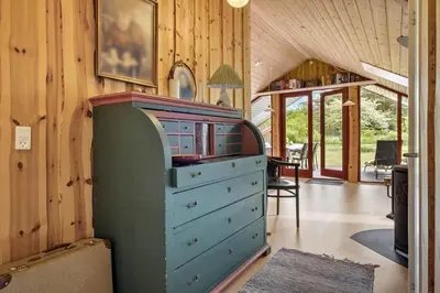 a room with a dresser with a blue drawer at JB361-Fjerritslev-Lyngbjergvej-58 in Fjerritslev