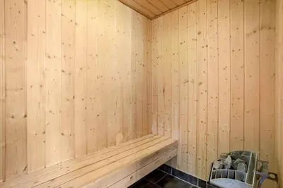 a corner of a wooden room with a sauna at JB316-Brovst-Kronvildtvej-250 in Brovst