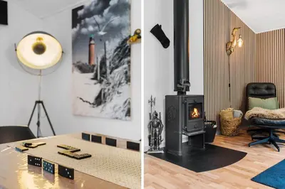 a living room with a wood stove in a room at JB162-Fjerritslev-Ronnevej-4 in Fjerritslev