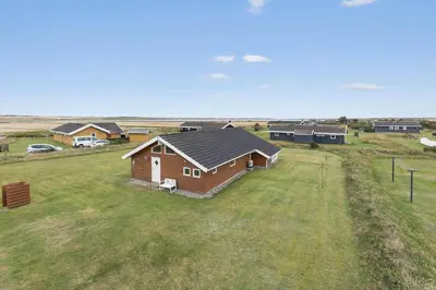 an overhead view of a house in a field at 814-Harboore-Neerlandiavej-176 in Harboør
