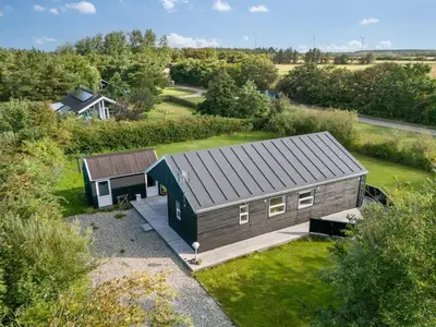 an overhead view of a small house in a field at Holiday Home Anja - 550m to the fjord by Interhome in Vemb