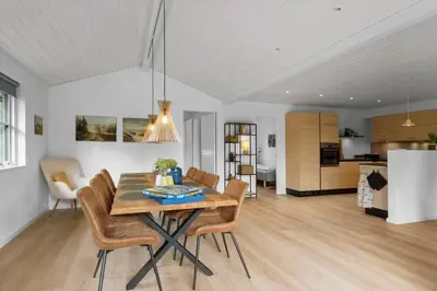 a kitchen and dining room with a table and chairs at BL1123-Saltum-Jydske-Rev-5 in Saltum