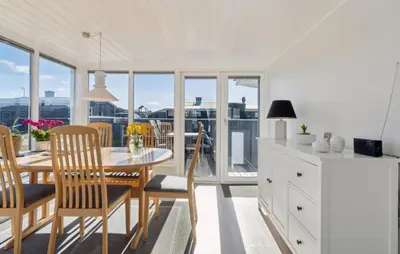 a kitchen and dining room with a table and chairs at Gorgeous Home In Thisted With House A Panoramic View in Thisted
