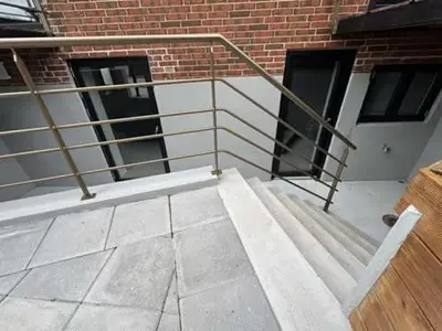 a set of stairs in front of a brick building at Østerbrogade 49 in Holstebro