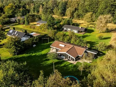 an aerial view of a house with a yard at Holiday Home Inola - 3-5km from the sea by Interhome in Fjerritslev