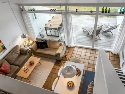 an overhead view of a living room with a couch and a table at Holiday Home Adelbrand - 1km from the sea by Interhome in Blokhus