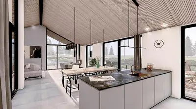 a kitchen and dining room with tables and windows at BL1127-Saltum-Bondagervej-23 in Saltum