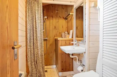 a bathroom with a sink and a toilet at 1069-Thisted-Kobbelsti-23 in Thisted