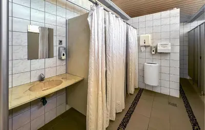 a bathroom with a sink and a shower at 2 Bedroom Beautiful Home In Hanstholm in Hanstholm