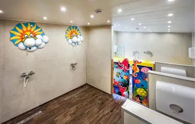 a bathroom with three lights on the wall at 1 Bedroom Cozy Home In Hanstholm in Hanstholm