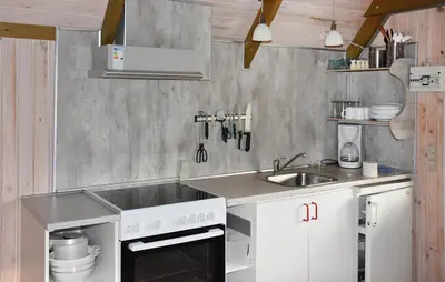 a kitchen with a sink and a stove at 1 Bedroom Cozy Home In Hanstholm in Hanstholm