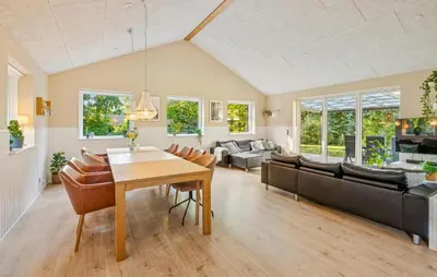 a living room with a table and a couch at Gorgeous Home In Farsø With Wifi in Farsø