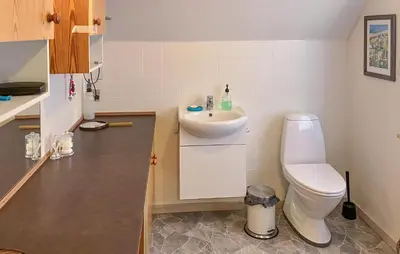 a bathroom with a sink and a toilet at 3 Bedroom Cozy Home In Bøvlingbjerg in Bøvlingbjerg