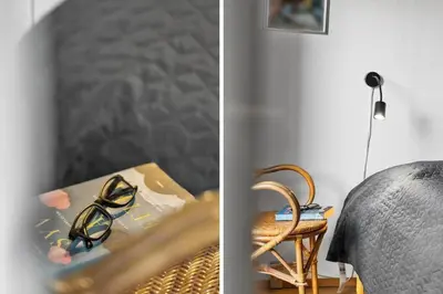 a pair of glasses sitting on a table next to a chair at 534-Lemvig-Lokkevej-13 in Lemvig