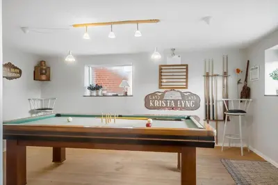 a living room with a pool table in it at 729-Thyboron-Vesterhavsgade-112 in Thyborøn