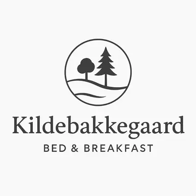 a logo for a bed and breakfast with a tree in the middle at Kildebakkegaard Bed and Breakfast in Nørager
