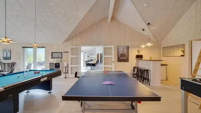 a large room with a pool table in it at Villavilla 429 - Hostrup Strand, Limfjorden in Spottrup