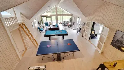 an overhead view of a ping pong table in a room at Villavilla 429 - Hostrup Strand, Limfjorden in Spottrup