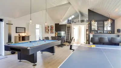 a living room with a pool table and chairs at Villavilla 476 - Vorupør, Nordjylland in Thisted