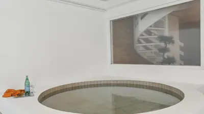 a bathroom with a sink and a mirror at Villavilla 680 - Blokhus, Nordjylland in Blokhus