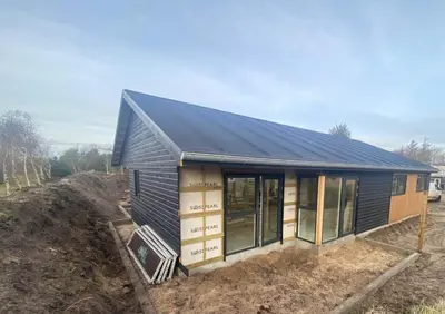 a house being constructed with a metal roof at BL1149-Blokhus-Paa-Bakken-12 in Blokhus