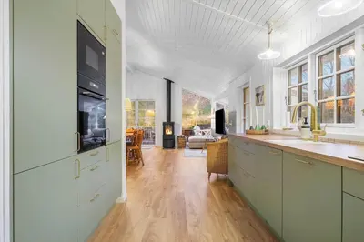 a kitchen with a sink and a counter top at BL1148-Blokhus-Havorns-Alle-6 in Blokhus