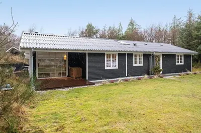 a small house with a yard in front of it at BL1148-Blokhus-Havorns-Alle-6 in Blokhus