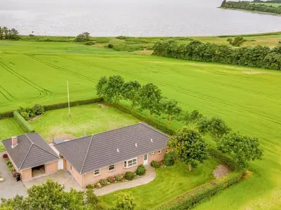 an overhead view of a house with a large yard at Holiday Home Erja - 300m to the fjord by Interhome in Roslev