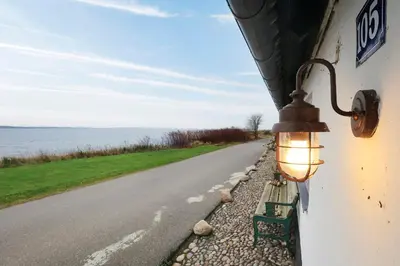 a street light on the side of a road at Historic Ferry House By Limfjorden In Sillerslev in Øster Assels