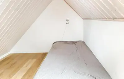 a mattress in the corner of a room at Stunning Apartment In Roslev With Wifi in Roslev