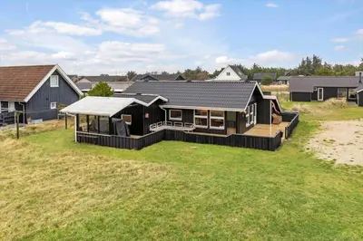 a home with a large yard with a house at 1369-Thisted-Nordsovej-94 in Nørre Vorupør