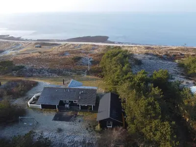 an aerial view of a house on the beach at Holiday Home With Private Beach Trail And Sea View in Trend