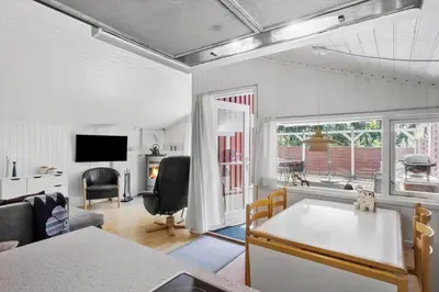 a living room with a couch and a table at JB381-Fjerritslev-Ahornvej-65