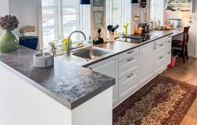 a kitchen with a sink and a counter top at Nice Home In Løgstrup With Wifi in Løgstrup