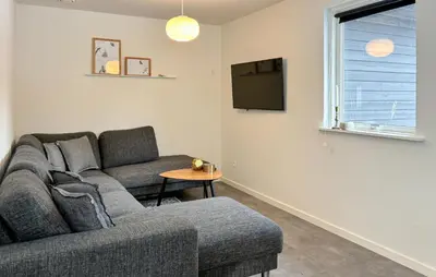 a living room with a couch and a tv at Awesome Home In Erslev With Wifi in Erslev
