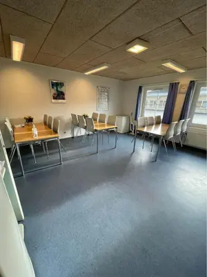 a conference room with a table and chairs in it at Roslev Vandrerhjem-Hostel in Roslev