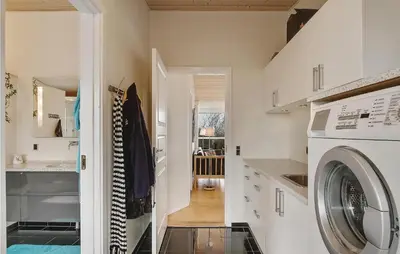 a laundry room with a washer and dryer at Awesome Home In Vinderup With Wifi in Vinderup