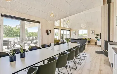 a large room with a long table and chairs at Seven-Bedroom Holiday Home In Spottrup in Spottrup