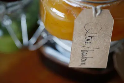 a jar of fruit with a price tag on it at Stenbjerg Kro & Badehotel in Snedsted