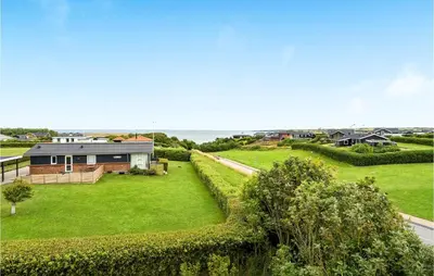 an aerial view of a house with a yard at Two-Bedroom Holiday Home In Lemvig in Lemvig
