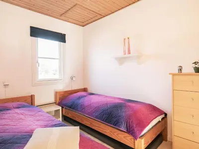 a bedroom with two beds and a window at 5 person holiday home in Vestervig-By Traum in Vestervig