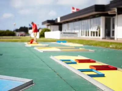 a row of colored tramp trays in front of a building at 5 person holiday home in Vestervig-By Traum in Vestervig