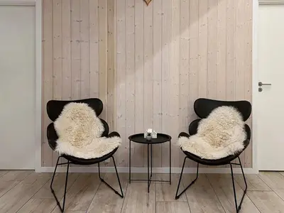 two chairs in a room with a table at 8 person holiday home in Roslev-By Traum in Roslev