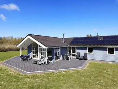 a house with solar panels on its deck at 8 person holiday home in Fjerritslev in Fjerritslev